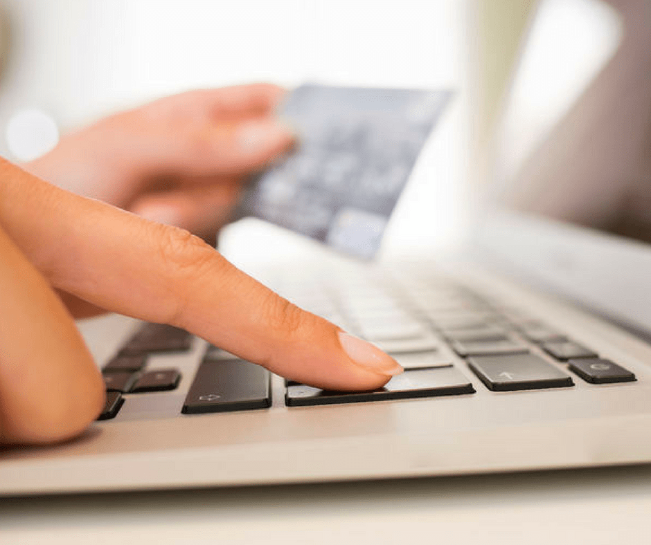 finger on computer shopping online