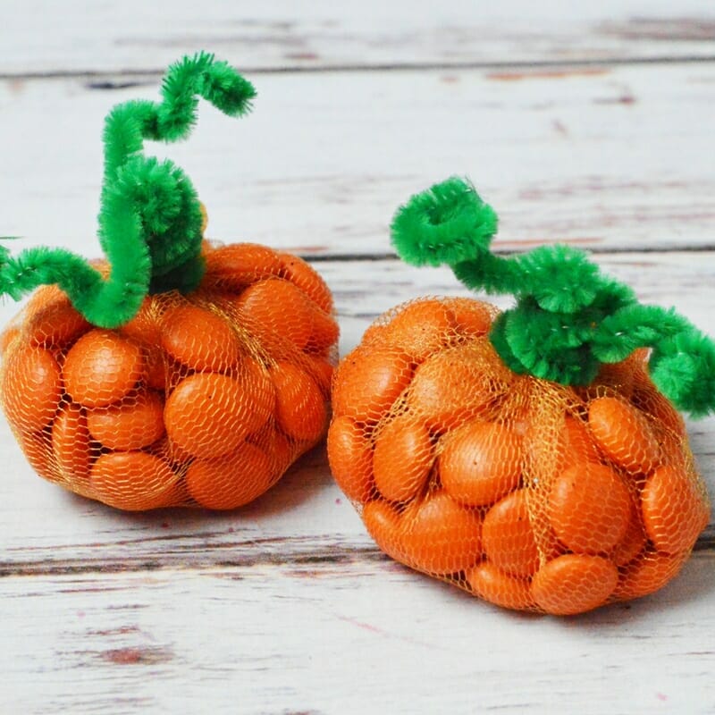 Halloween treat idea! Make these cute Candy Pumpkins! They are even a great DIY idea for a class party!!