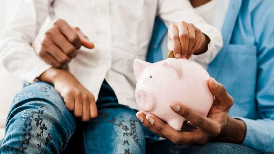 teach toddlers about money with a piggy bank