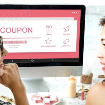 Women discussing digital coupons