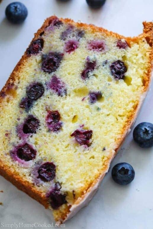 This Blueberry Bread is a scrumptious mix of juicy berries, citrusy-sweet lemon, & moist rich bread. This dessert is perfect anytime of day!