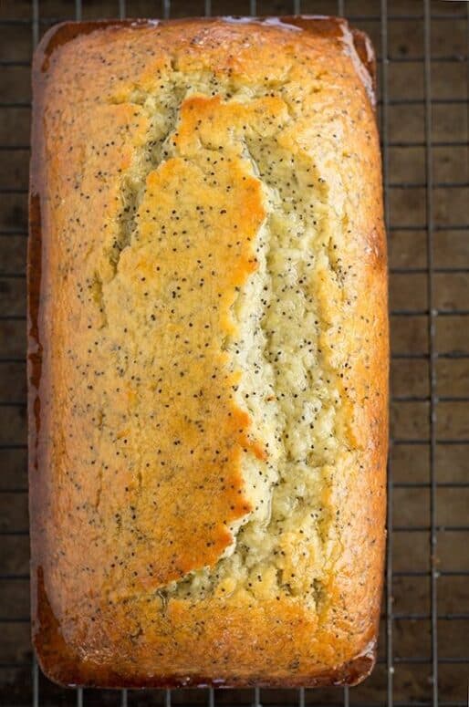 Lemon Poppy Seed Bread recipe is a favorite for breakfast or dessert with a deliciously light crumb and plenty of lemon shining through. 